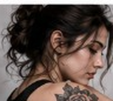 Portrait photo of a woman with a rose tattoo